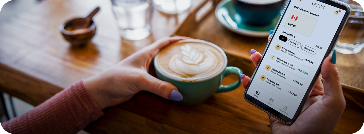 A person effortlessly managing their XEPPT account on a smartphone while having a latte at a cafe.