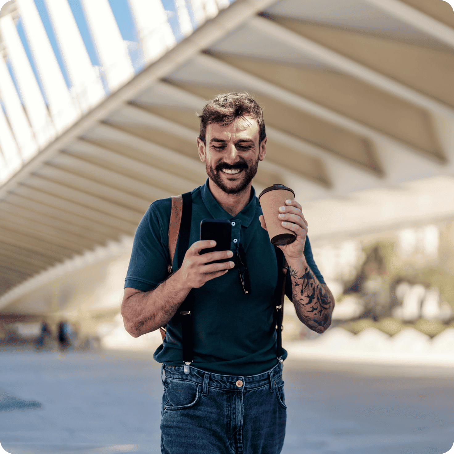 man walking with a coffee mug